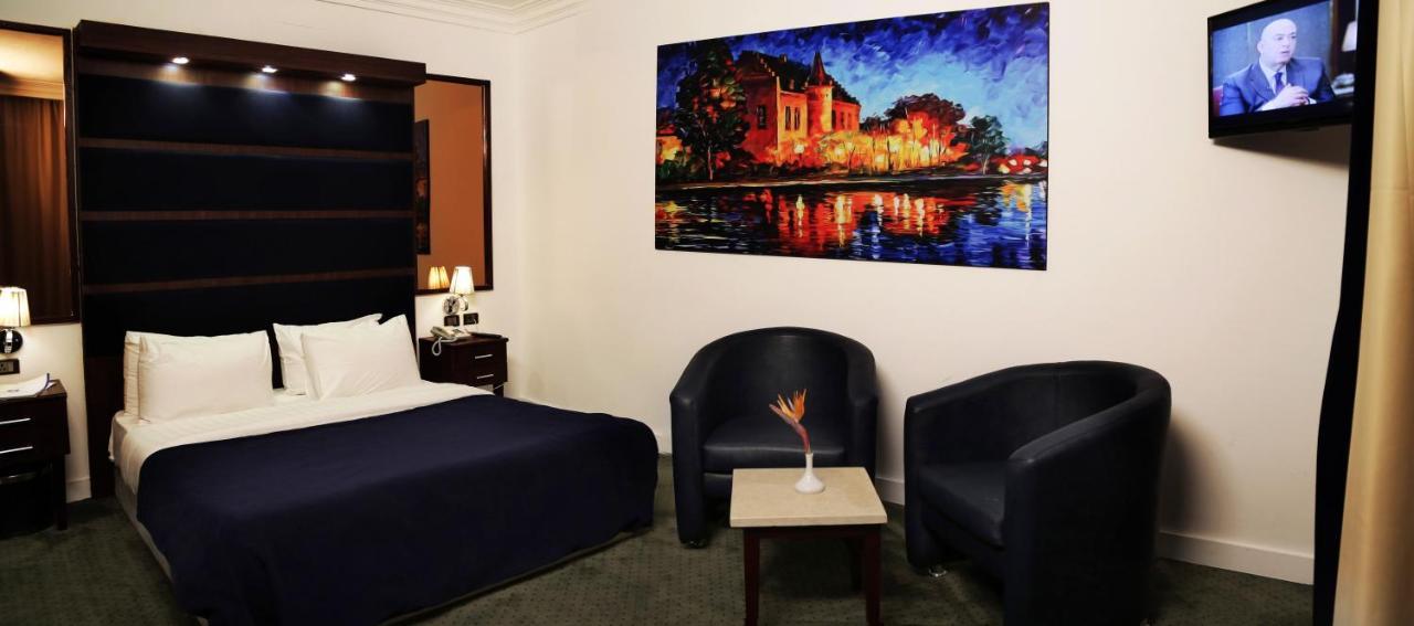 Spectra Inn Hotel 'Ezbet Sharikat Wardan Bagian luar foto