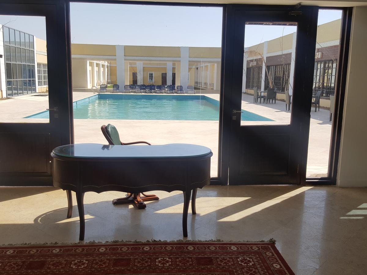 Spectra Inn Hotel 'Ezbet Sharikat Wardan Bagian luar foto